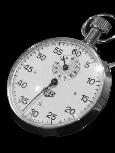 KinseyInvestigaitons.com Missing Persons in LA - A stopwatch sits against a black background.