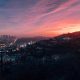 Skyline of Los Angeles seen from surrounding hills at dusk - Consult KinseyInvestigations.com.