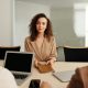 Woman with curly hair at a job interview - Contact KinseyInvestigations.com.